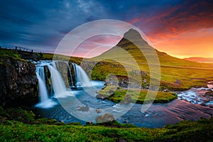 The Kirkjufellsfoss waterfall the coast of Snaefellsnes peninsula. Location Iceland