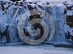 The Kirkjufellsfoss waterfall in Iceland in the evening