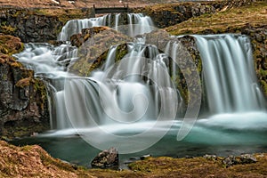 Kirkjufellsfoss waterfall in Icelands. moving water photo