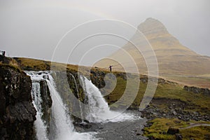 Kirkjufellsfoss Waterfall and Kirkjufell mountain in Iceland