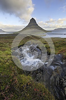 Kirkjufellsfoss waterfall with Kirkjufell mountain Iceland