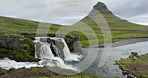 Kirkjufellsfoss waterfall and mountain, in Iceland on the Snaefellsnes Peninsula.