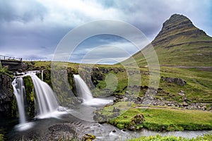 Kirkjufellsfoss waterfall and mountain, long exposure, in Iceland on the Snaefellsnes Peninsula