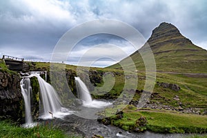 Kirkjufellsfoss waterfall and mountain, long exposure, in Iceland on the Snaefellsnes Peninsula