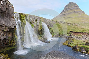 Kirkjufellsfoss waterfall near the Kirkjufell mountain