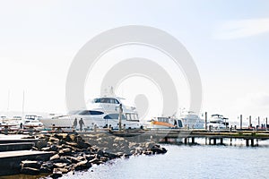 Kirkland, Washington, USA. February 2020. The waterfront of lake Washington in clear weather. View of moored yachts near the shore