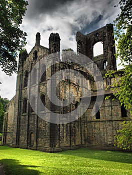 Kirkstall Abbey is a ruined Cistercian monastery in Kirkstall, north-west of Leeds city centre in West Yorkshire, England. photo