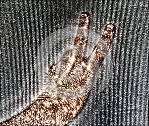 Kirlian coronal aura photography of a male human hand showing a beautiful glowing energy