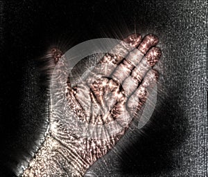 Kirlian coronal aura photography of a male human hand showing a beautiful glowing energy