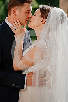 kiss. lovers and happy bride and groom. romance and tenderness in relationships.