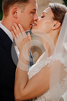 kiss. lovers and happy bride and groom. romance and tenderness in relationships.