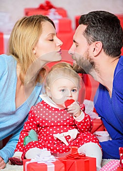 Kiss me. father, mother and doughter child. Love and trust in family. Bearded man and woman with little girl. Happy