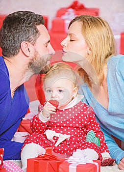 Kiss me. father, mother and doughter child. Love and trust in family. Bearded man and woman with little girl. Happy