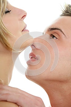 Kiss over white, young passion couple