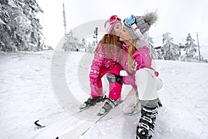 Kiss to mother before descend with skis