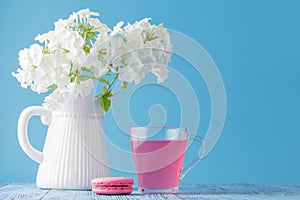 Kissel of currant berries in a glass and macaroon