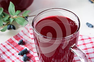 Kissel of honeysuckle in glass