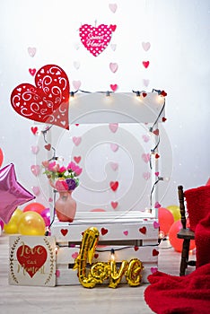 Kissing booth in photo studio for children`s photo shoot.