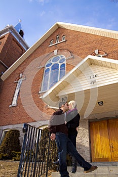 Kissing by the church