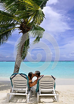 Kissing couple on beach