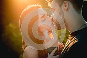 Kissing couple portrait. Close-up of beautiful passionate sexy couple kiss.