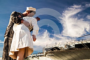 Kissing statue andUSS Midway Aircraft carrier