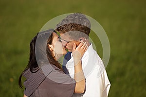 Kissing teenage couple