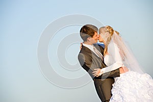 Kissing wedding pair