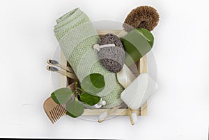 Kit of eco cosmetics bath tools. Soap, bamboo toothbrush, natural brush, towel. Zero waste, Plastic free. Sustainable lifestyle