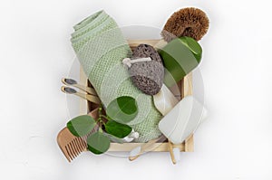 Kit of eco cosmetics bath tools. Soap, bamboo toothbrush, natural brush, towel. Zero waste, Plastic free. Sustainable lifestyle