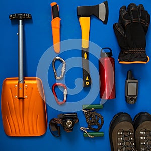Kit of gear for survival on a blue background
