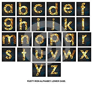 Kit.Lower case. Alphabet from letters, from rusty iron, on a wooden plank. Isolated on white background. Education