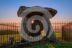 Kit's Coty House megalith monument and sunset sky on background