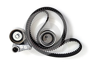 Kit of timing belt with rollers on a white background isolated.