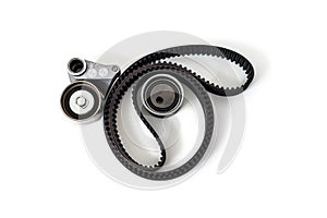 Kit of timing belt with rollers on a white background isolated.