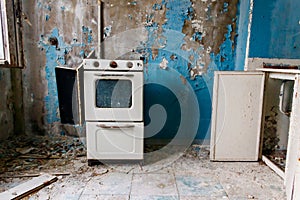 Kitchen of abandoned apartment in ghost town Pripyat in Chernobyl Exclusion Zone, Ukraine