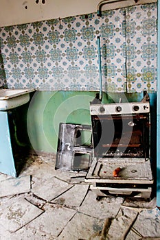 Kitchen of abandoned apartment in ghost town Pripyat in Chernobyl Exclusion Zone, Ukraine