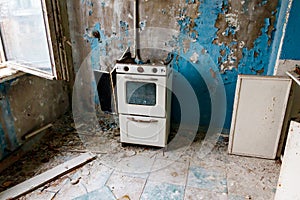 Kitchen of abandoned apartment in ghost town Pripyat in Chernobyl Exclusion Zone, Ukraine