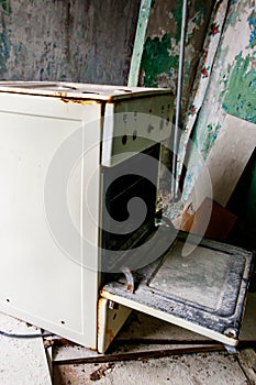 Kitchen of abandoned apartment in ghost town Pripyat in Chernobyl Exclusion Zone, Ukraine