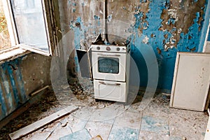 Kitchen of abandoned apartment in ghost town Pripyat in Chernobyl Exclusion Zone, Ukraine