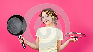 Kitchen accessory. Healthy food. Perfect for pancakes. Small girl with curlers in hair. Pin up style. Culinary and house