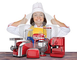 Kitchen Appliances Set. Beautiful Young Woman Chef Show Thumbs U