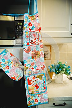 Kitchen apron and potholders in the kitchen