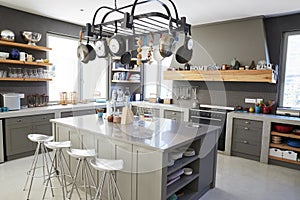 Kitchen Area Of Modern Home Interior With Island And Appliances