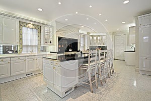 Kitchen with black top marble island