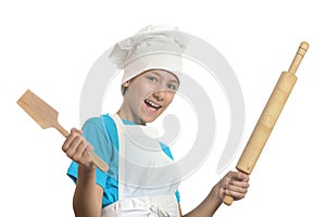 Kitchen boy holding battledore and spatula