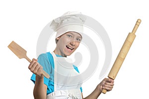 Kitchen boy holding battledore and spatula photo