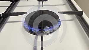 Kitchen Burner Blue Gas Fire Of Stove. Light Gas Cooker. Chef Cooking Food. Appearing Blue Flame On Gas Stove.