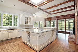 Kitchen with ceiling wood beams