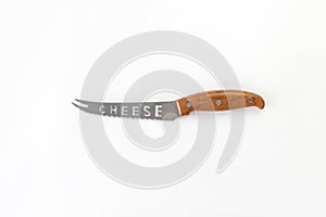 Kitchen chef knive for cheese laying on white background, flat lay, view from above, space for a text. Chef, restaurant or kitchen